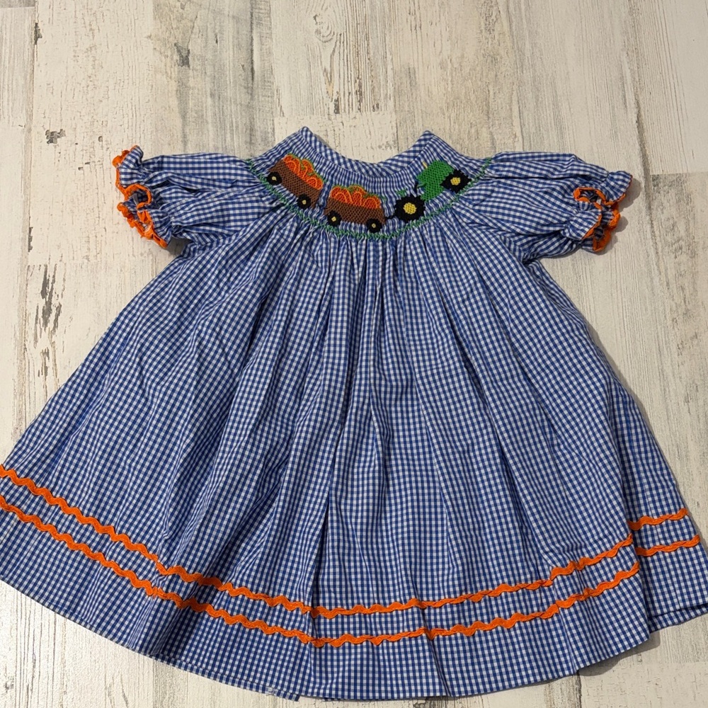 Banana Split Pumpkin Farm Gingham Kids Smocked Dress with Tractor Design - Picture 2 of 9